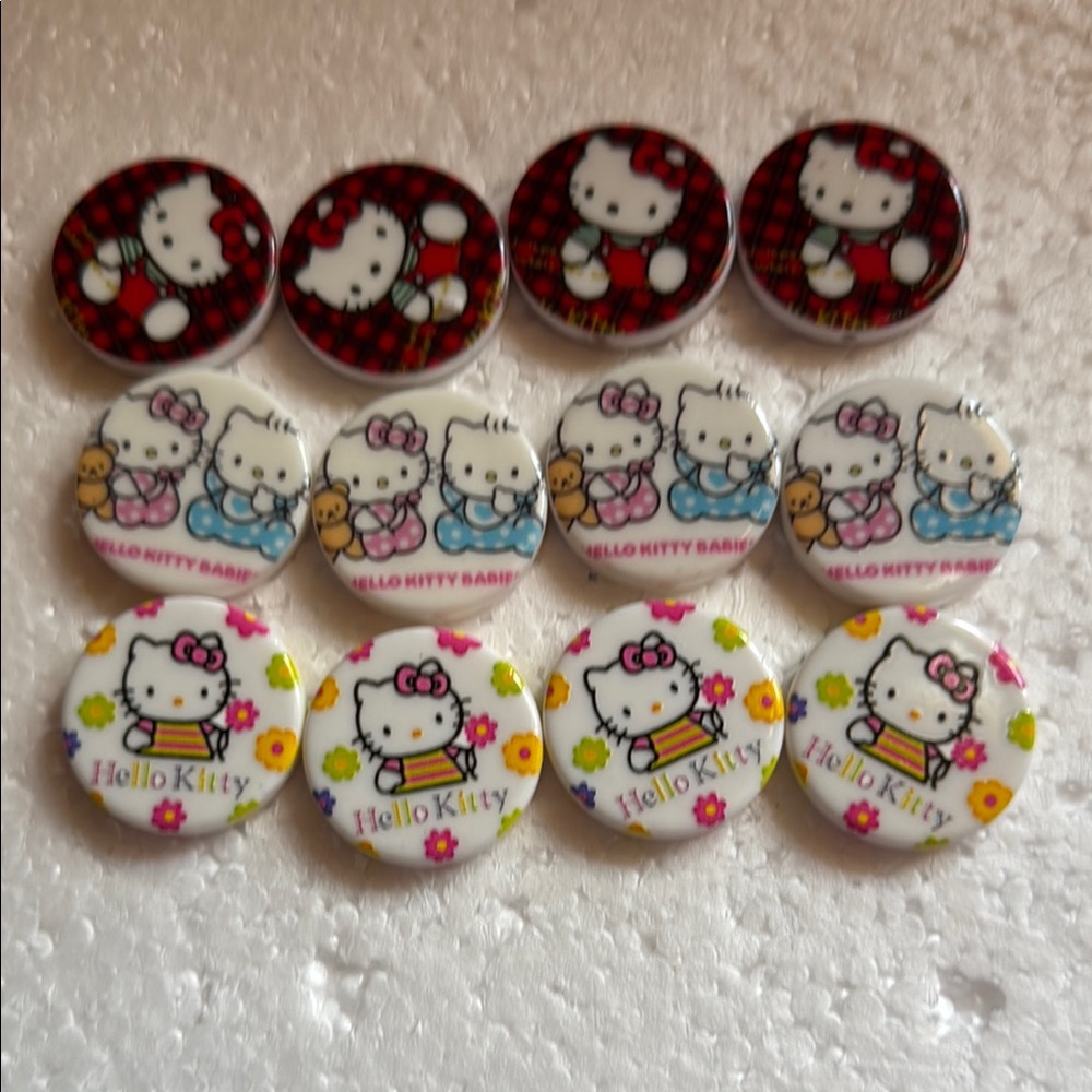 Sanrio hello kitty lot of 12 inch round flat beads. Will fit pens.